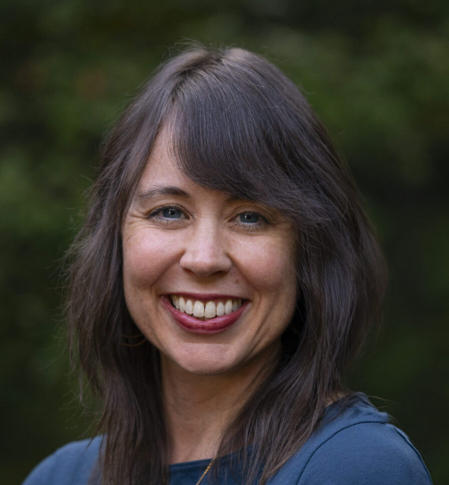 Headshot of Jessica Fern in blue shirt.