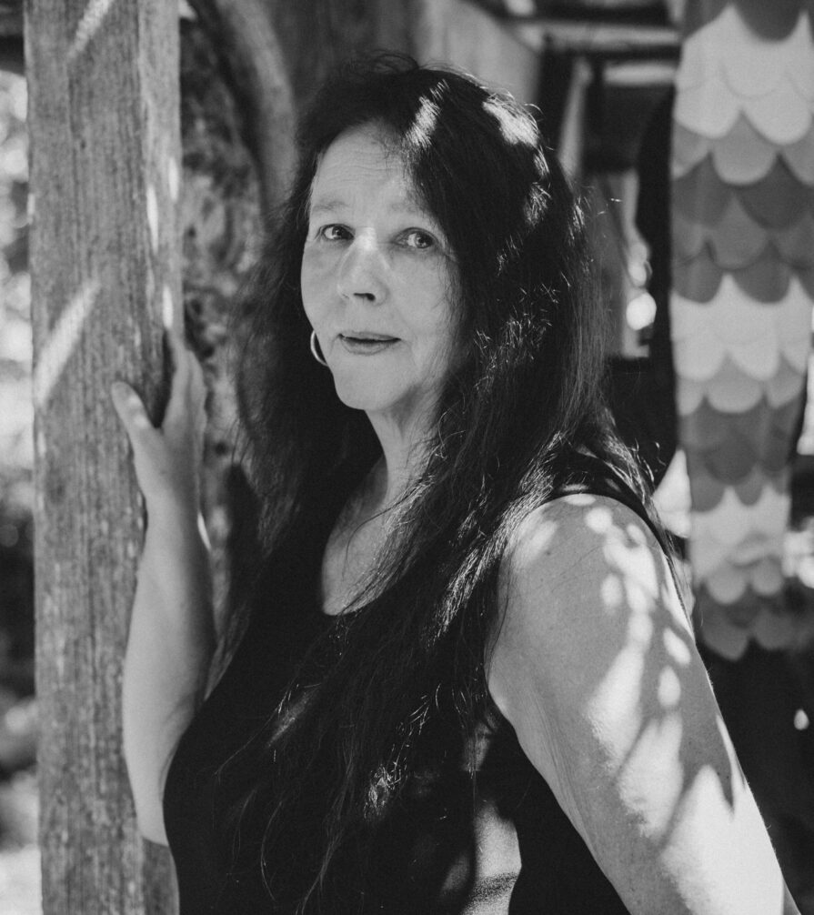 Headshot of Theresa Kishkan in black and white.